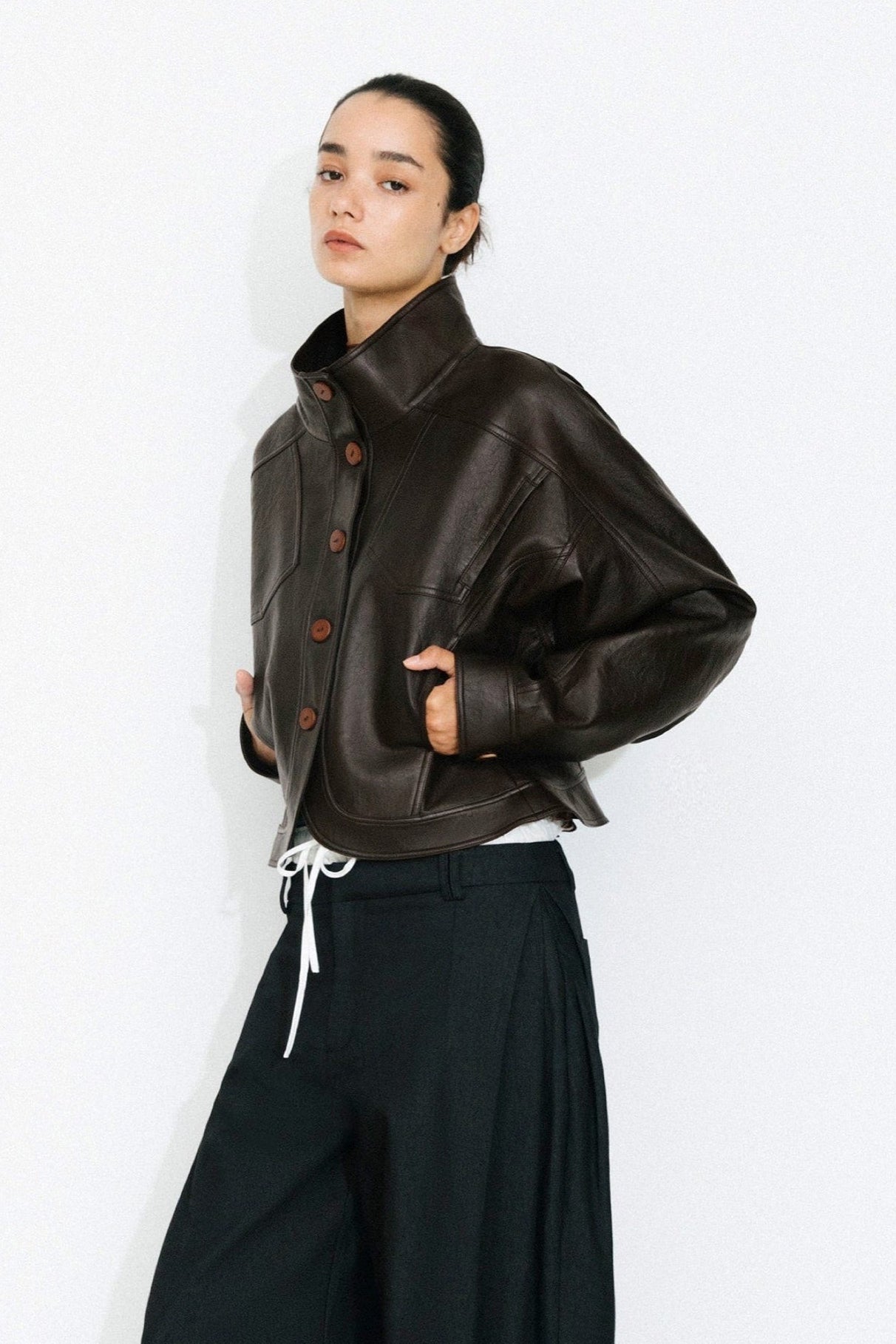 Curved Sleeved Faux Leather Jacket