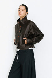 Curved Sleeved Faux Leather Jacket