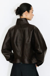 Curved Sleeved Faux Leather Jacket