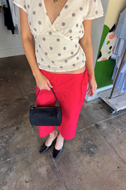 Red Tie Capri
